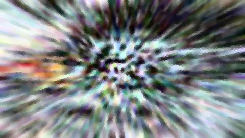 Abstraktes Bild mit verwischten bunten Streifen, die strahlenförmig von der Mitte ausgehen, in Grün, Lila, Weiß und Rot, mosaikartig pixelig.