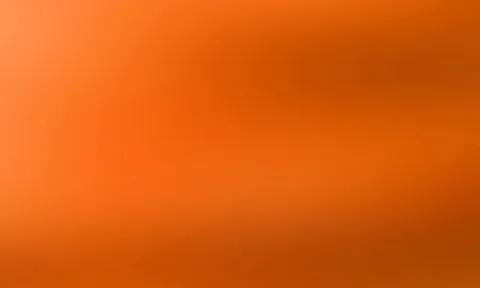 Weicher Farbverlauf in Orange, heller im linken oberen Bereich und dunkler zur rechten Seite und nach unten hin.