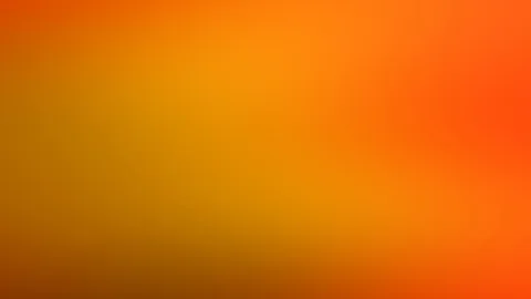 Weich verschwommener Farbverlauf von Orange über Gelb bis Rotorange, rechts oben intensiver, links unten dunkler und bräunlich.