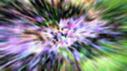 Abstraktes Bild mit radialem Zoom-Effekt: Von der Mitte strahlen lila, grüne und weiße Schlieren nach außen, die Fläche wirkt mosaikartig gepixelt.