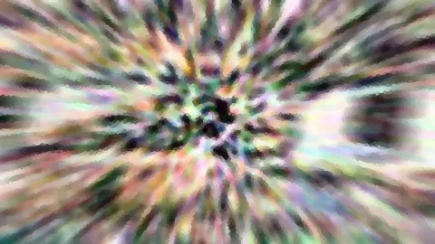 Abstraktes Bild mit farbigen, pixeligen Streifen, die radial von einem dunklen Zentrum nach außen verlaufen.