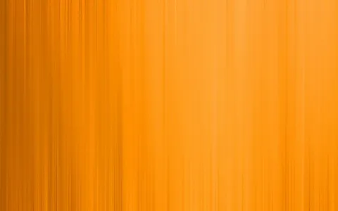 Vertikal verwischte Linien in verschiedenen Orangetönen, von dunkleren Tönen links zu hellerem Orange rechts.
