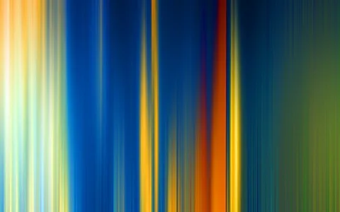 Vertikal verwischte Streifen in Gelb, Blau, Orange und Grün, die von links hell nach rechts dunkler ineinander übergehen.