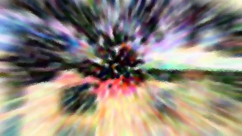 Abstrakte Komposition aus bunten, radial auseinanderlaufenden Schlieren mit dunklem Zentrum und pixeligem Mosaikeffekt.