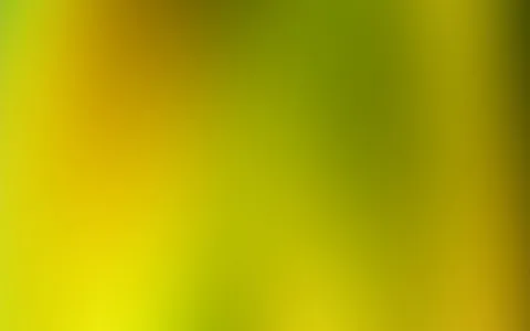 Unscharfer Farbverlauf in Gelb, Gold und Olivgrün mit dunkleren Grünflächen im oberen rechten Bereich