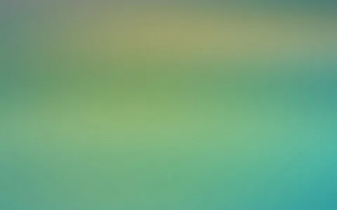 Unscharfer Farbverlauf von olivgrünen Tönen oben in Richtung türkisfarbenem Blau unten rechts, ohne erkennbare Motive.
