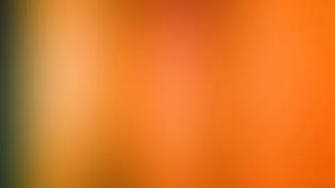 Weich verlaufender Farbverlauf von Orange über Rotorange bis Ocker, am linken Rand dunkles Olivgrün.