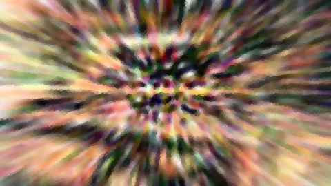 Abstrakte bunte Farbstreifen laufen radial von einem dunklen Zentrum nach außen, verwischt und leicht gepixelt.