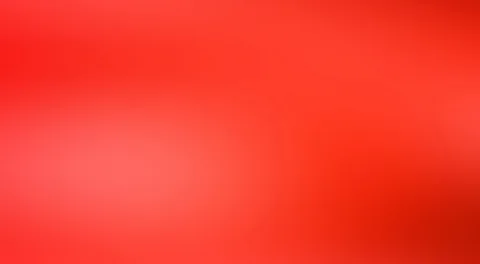 Ein nahezu gleichmäßiger roter Farbverlauf mit hellerem Bereich links der Mitte und dunklerem Rot rechts unten.