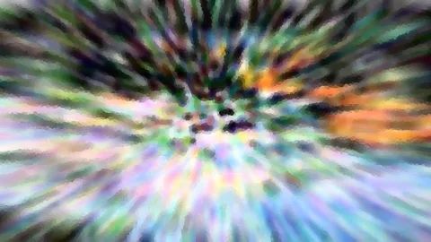 Abstraktes Bild mit radialen, verwischten Farbstrahlen in Grün, Lila, Orange und Pastelltönen, die von einem dunklen Zentrum nach außen laufen. Die Oberfläche wirkt mosaikartig gepixelt.