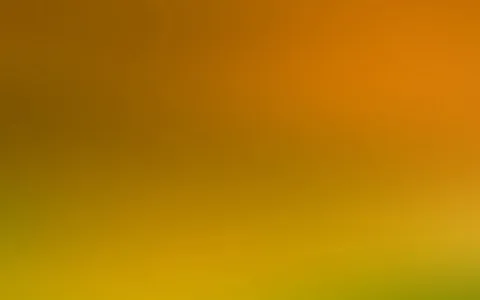 Weicher Farbverlauf von dunklem Ocker oben links über Orange bis zu leuchtendem Gelb und Olivgrün unten