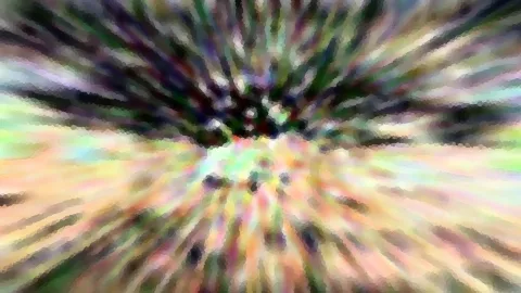 Abstrakte Komposition aus bunten Farbstreifen, die von einem dunklen Zentrum oben in der Mitte radial nach außen laufen, mit mosaikartiger Pixelstruktur.