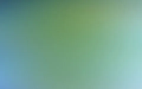 Unscharfer Farbverlauf von dunklem Blaugrau oben links über Olivgrün in die Mitte bis zu Hellblau und Mintgrün rechts unten