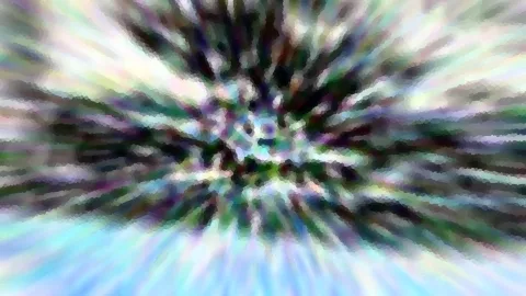Abstraktes Bild mit radialem Zoomeffekt: bunte Streifen in Grün, Blau, Violett und Weiß laufen von einem dunklen Zentrum nach außen.