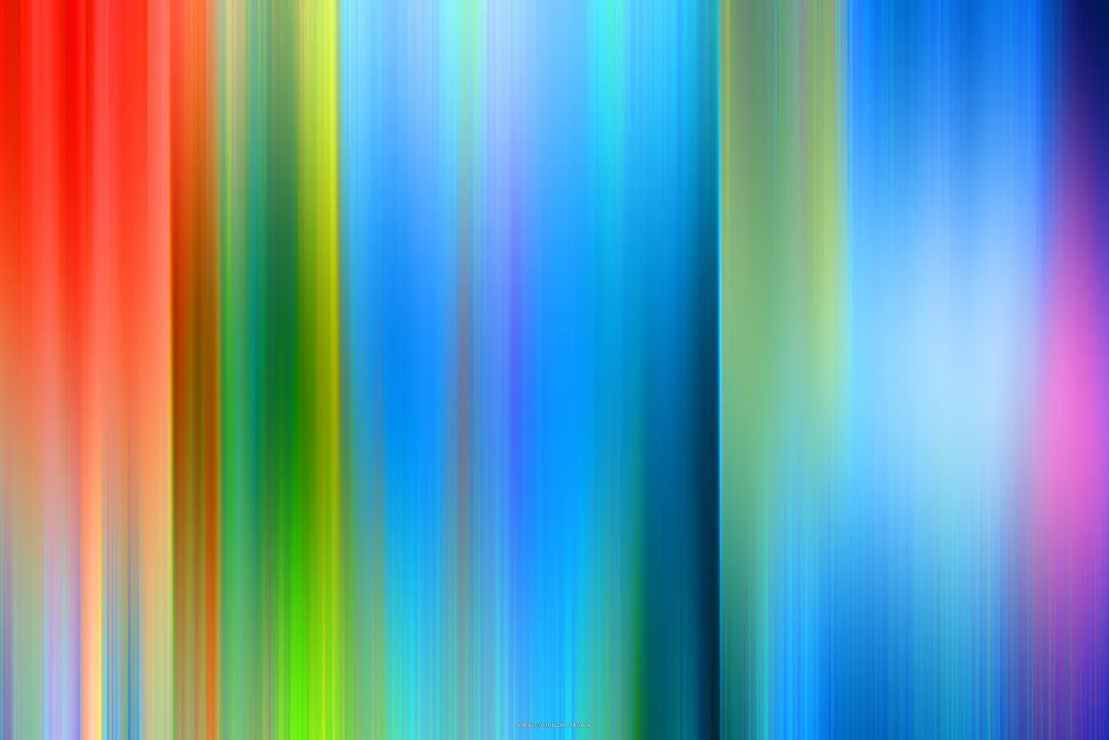 Verschwommene vertikale Streifen in Rot, Grün, Gelb, Blau und Violett, die von links nach rechts ineinander übergehen.