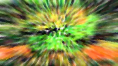 Abstraktes Bild mit radial verlaufenden grünen, gelben und orangefarbenen Schlieren um ein dunkles Zentrum.