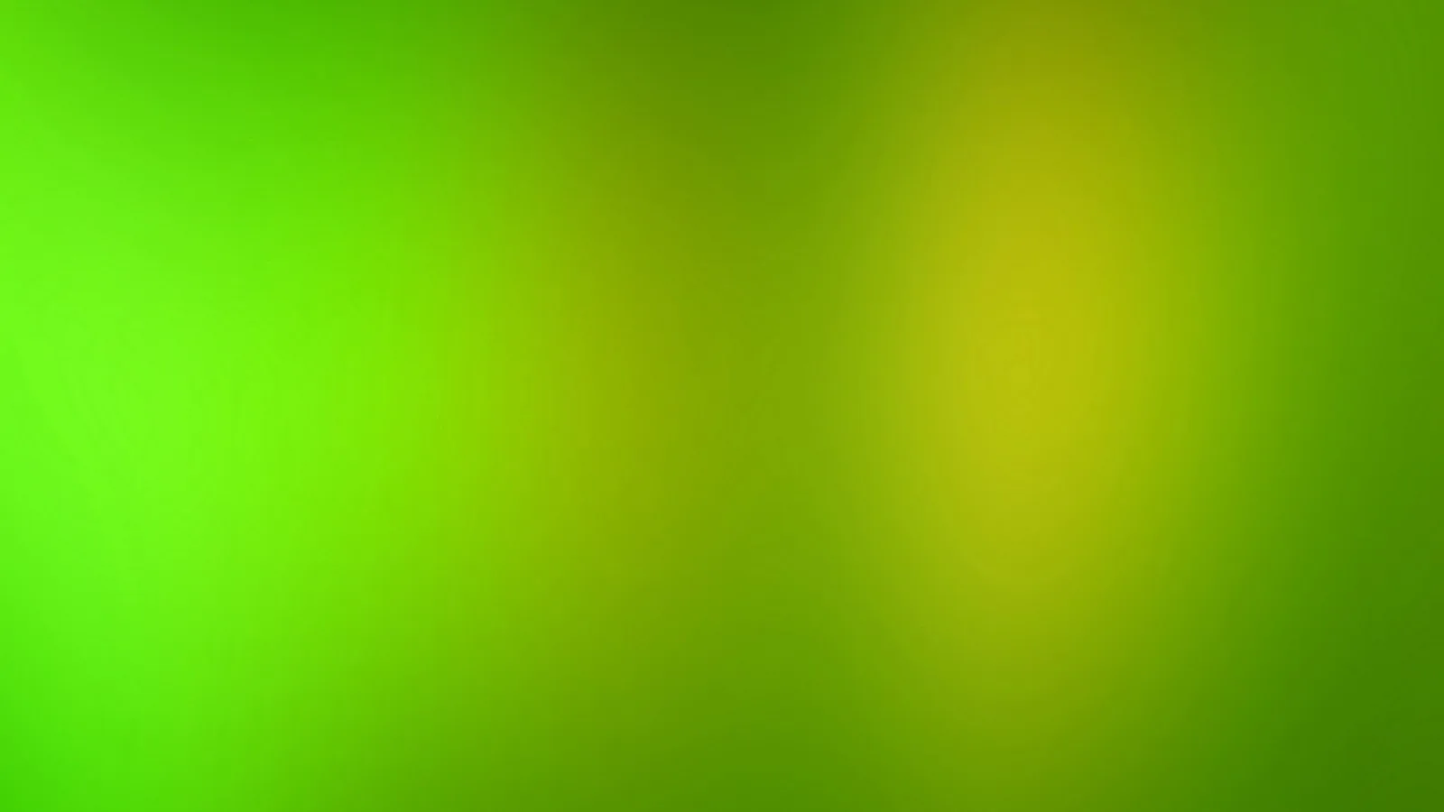 Weicher Farbverlauf in Grün und Gelb, links hell leuchtendes Grün, in der rechten Bildhälfte ein gelblicher Lichtfleck.