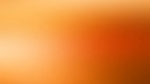 Unscharfer Farbverlauf in Orange, links heller und cremefarben, rechts tiefes Rotorange