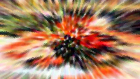 Abstrakte radiale Unschärfe mit roten, grünen und weißen Streifen, die von einem dunklen Zentrum in der Mitte nach außen laufen