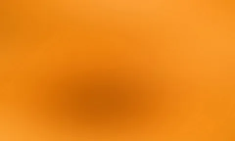 Unscharfer orangefarbener Verlauf, in der Mitte etwas dunkler und rötlich-braun, zu den Rändern heller.