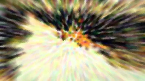 Abstrakte Komposition mit radial von der Mitte nach außen laufenden, verwischten Streifen in Gelb, Grün, Orange und Schwarz, grob gepixelt.