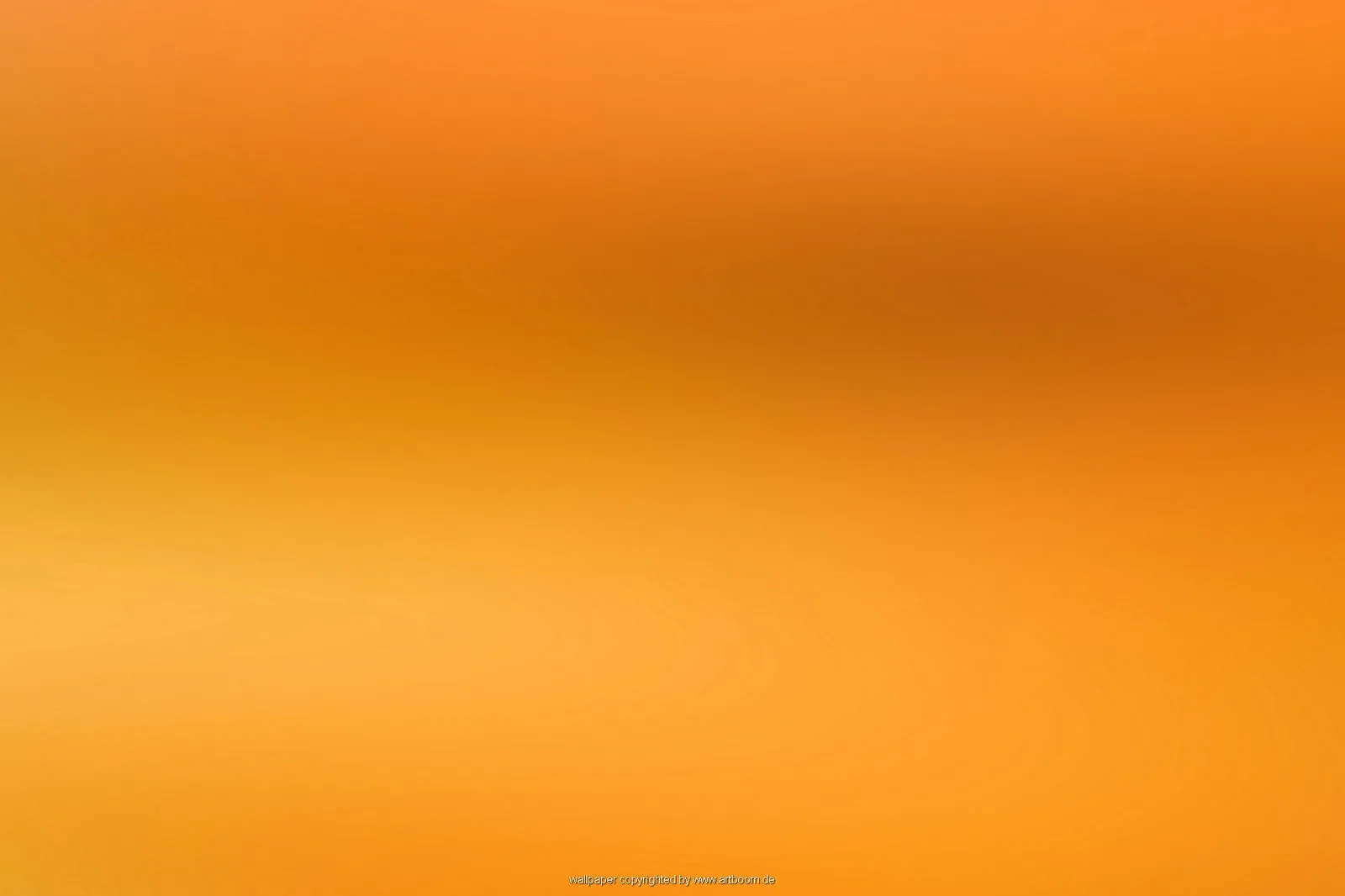 Unscharfer Verlauf in Orange und Gelb, oben dunkler, unten heller, ohne erkennbare Motive.