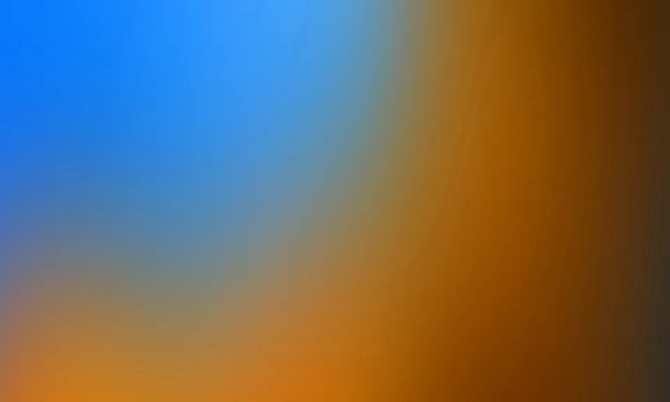 Weicher Farbverlauf von Blau oben links zu Orange und Braun unten rechts.