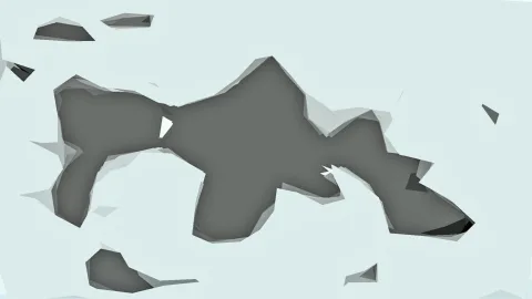 Abstrakte graue Form mit scharfen, facettierten Kanten auf hellgrauem Hintergrund, einzelne kleine Splitter am Rand.