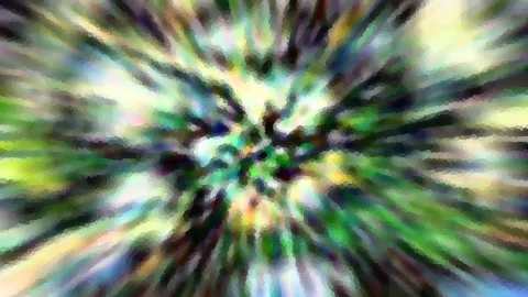 Abstraktes Bild mit radialem Zoomeffekt in Grün, Gelb und Violett, die Farbstreifen laufen von einem dunklen Zentrum nach außen.