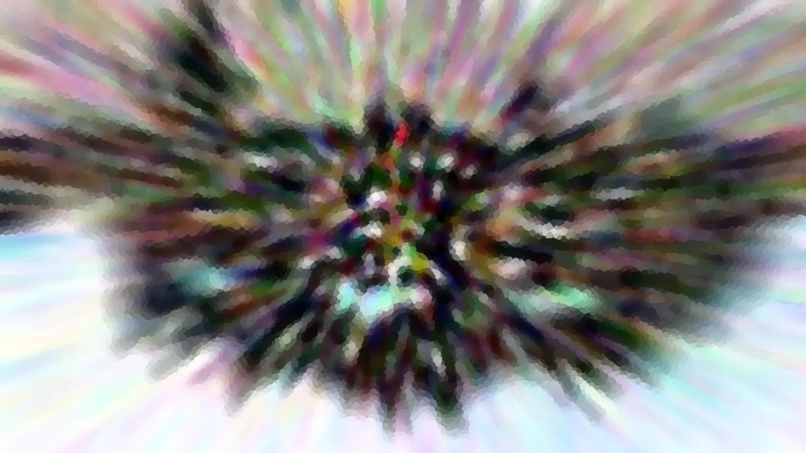 Abstraktes Bild mit radialer Zoom-Unschärfe: dunkles Zentrum aus bunten Pixelflecken, von dem sich farbige Streifen nach außen ziehen, an den Rändern helles Blau und Weiß.