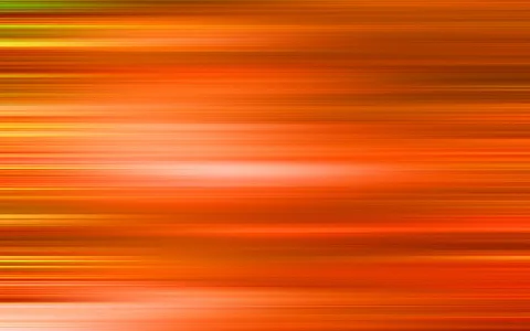 Abstrakte Fläche aus waagerechten, verwischten Streifen in Orange, Rot und Gelb mit einem helleren Lichtfleck in der Bildmitte.