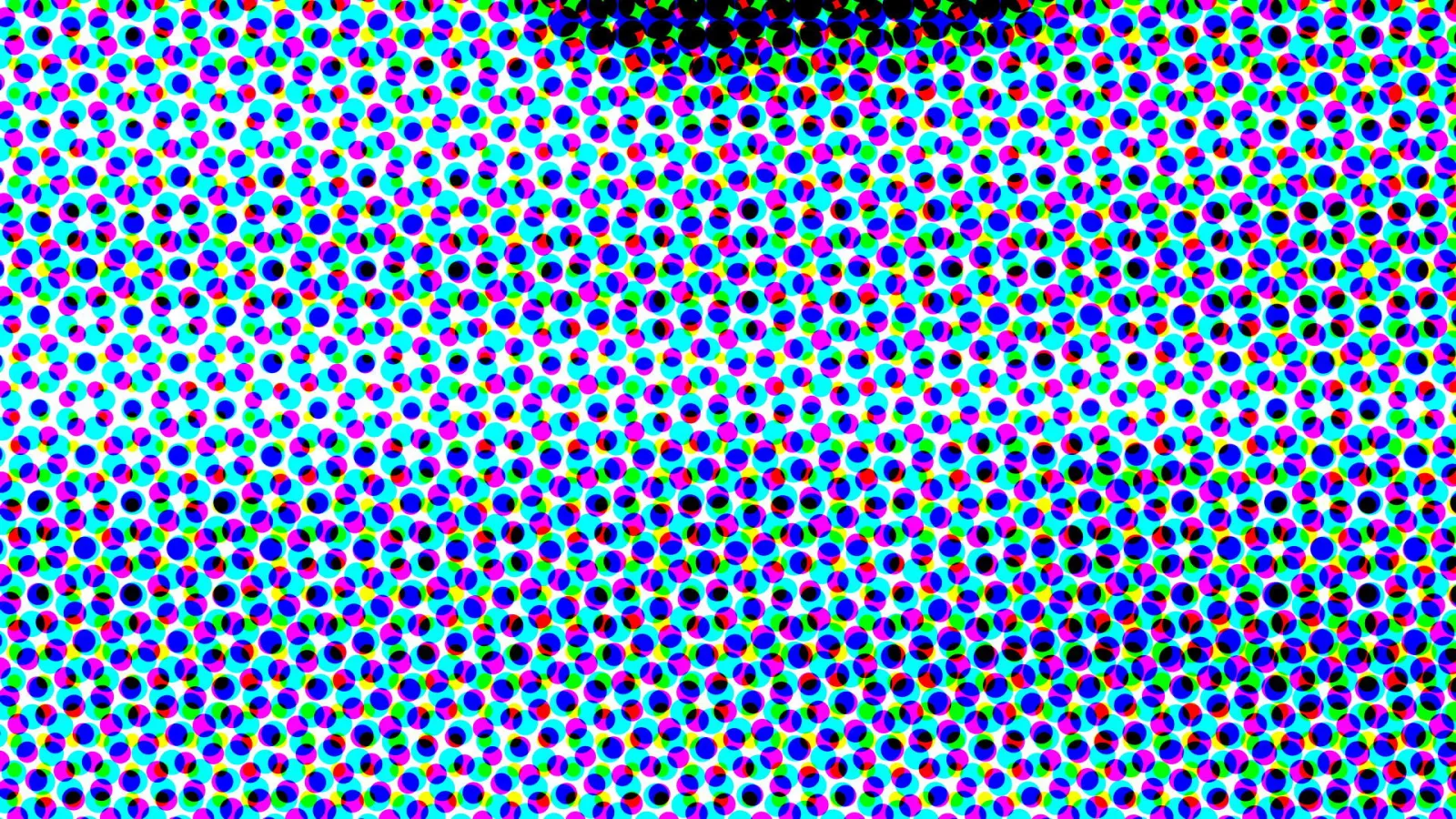 Dichtes Raster aus farbigen Punkten in Cyan, Magenta, Gelb und Schwarz auf weißem Grund, oben verdichten sich die schwarzen Punkte.