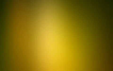 Unscharfer Farbverlauf von hellem Gelb in der Bildmitte zu dunklem Olivgrün und Braun an den Rändern