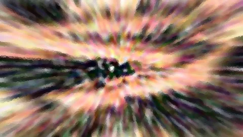 Abstraktes Bild mit radial von einem dunklen Zentrum nach außen laufenden Streifen in Rosa, Orange, Gelb und Grün, pixelig und verwischt.