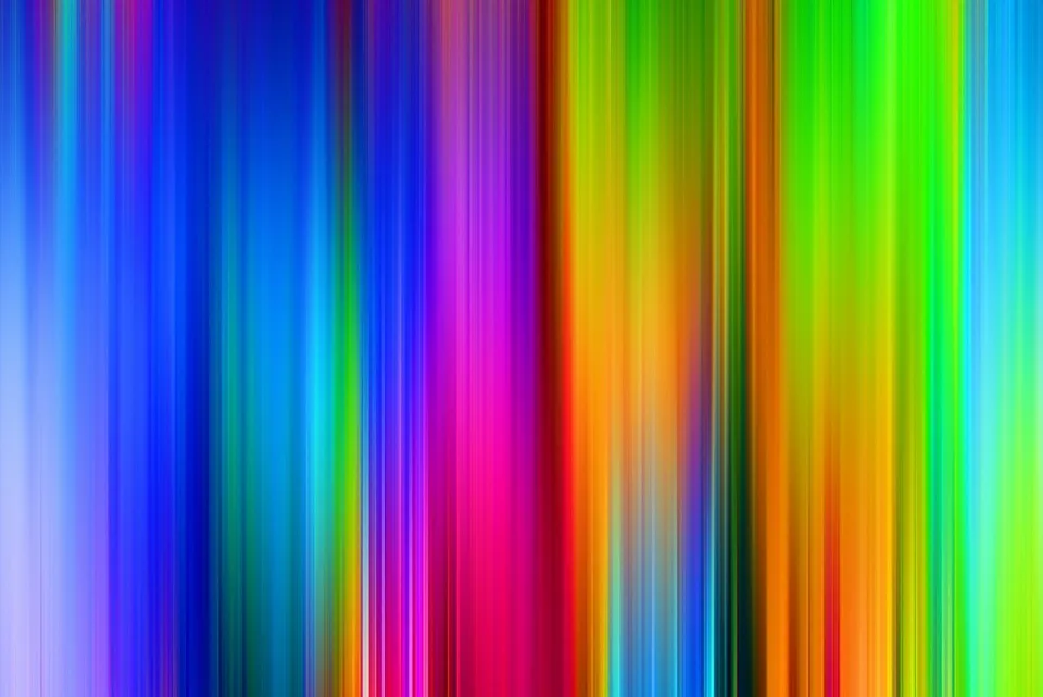 Abstrakte Komposition aus senkrechten, verwischten Streifen in Blau, Violett, Magenta, Rot, Orange, Gelb und Grün, die von links nach rechts ineinander übergehen.