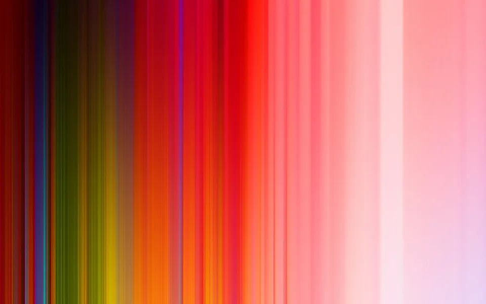 Vertikale, verwischte Streifen in Rot, Orange, Grün, Gelb und Rosa, die von dunklem Rot links zu hellem Rosa und Lila rechts übergehen.
