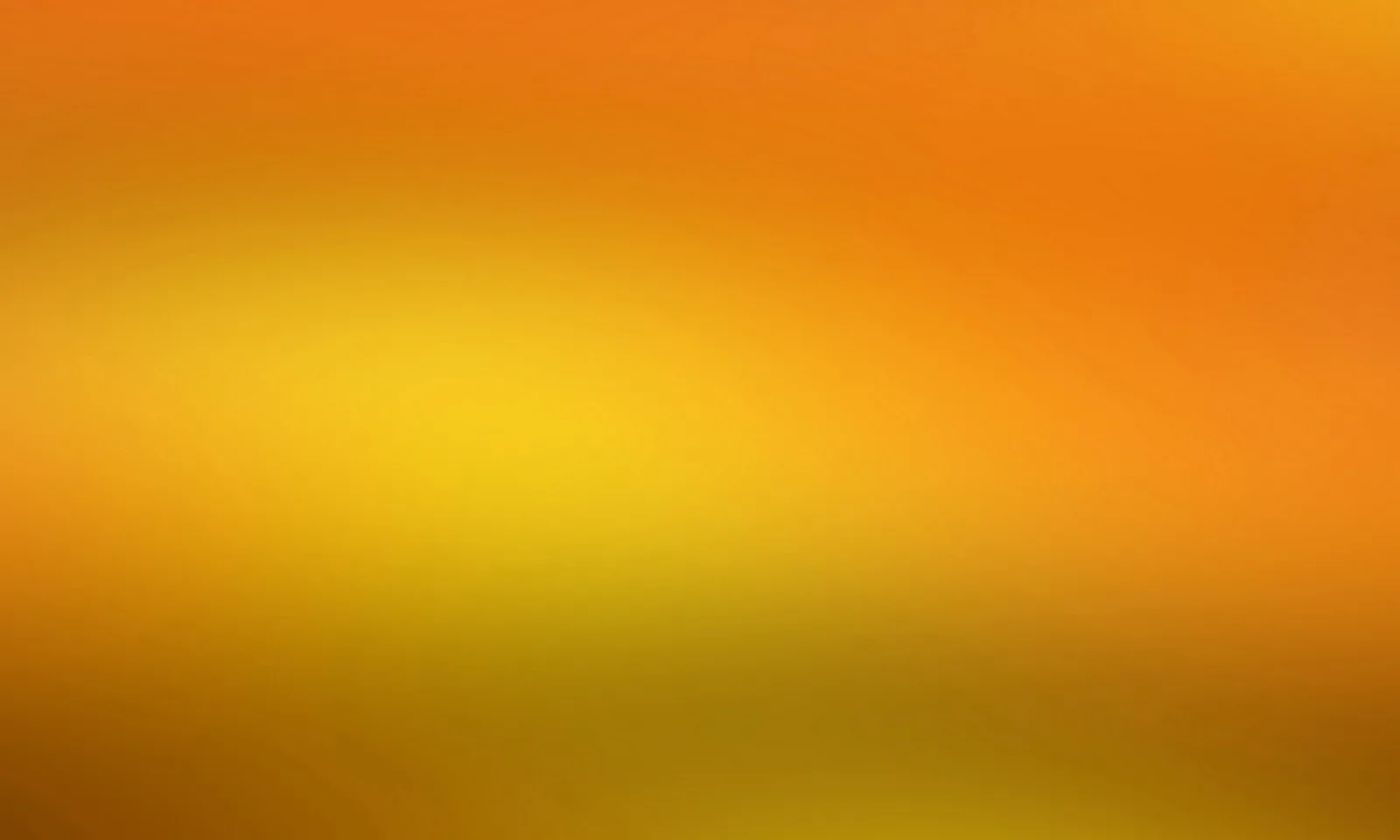Weich verschwommener Farbverlauf von Orange über Gelb bis Olivgrün, ohne erkennbare Motive oder Formen.