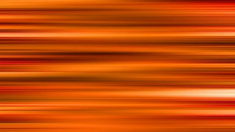 Abstraktes Bild aus waagerechten, unscharfen Streifen in Orange, Rot und Gelb, die dicht übereinanderliegen und Bewegung andeuten.