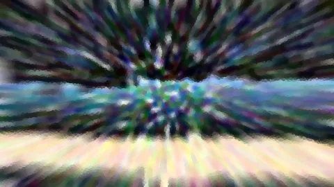 Abstrakte Komposition aus strahlenförmigen, bunten Farbflächen in Blau, Grün und Gelb, zur Mitte hin verdichtet.