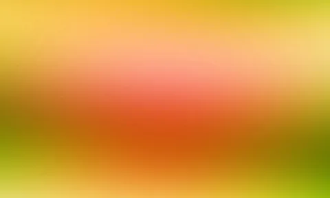Unscharfer Farbverlauf von Gelb oben über Orange und Rot in der Mitte bis zu Grün unten
