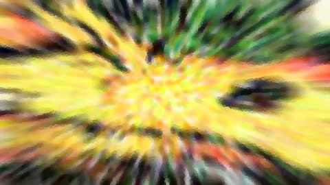 Abstrakte Komposition mit radial von der Mitte ausstrahlenden Streifen in Gelb, Grün und Rot, die durch Bewegungsunschärfe und ein feines Mosaikraster wirkt.