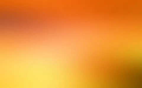 Weich verlaufender Farbverlauf von dunklem Orange oben über helles Gelb unten, rechts mit einem bräunlichen Schatten.