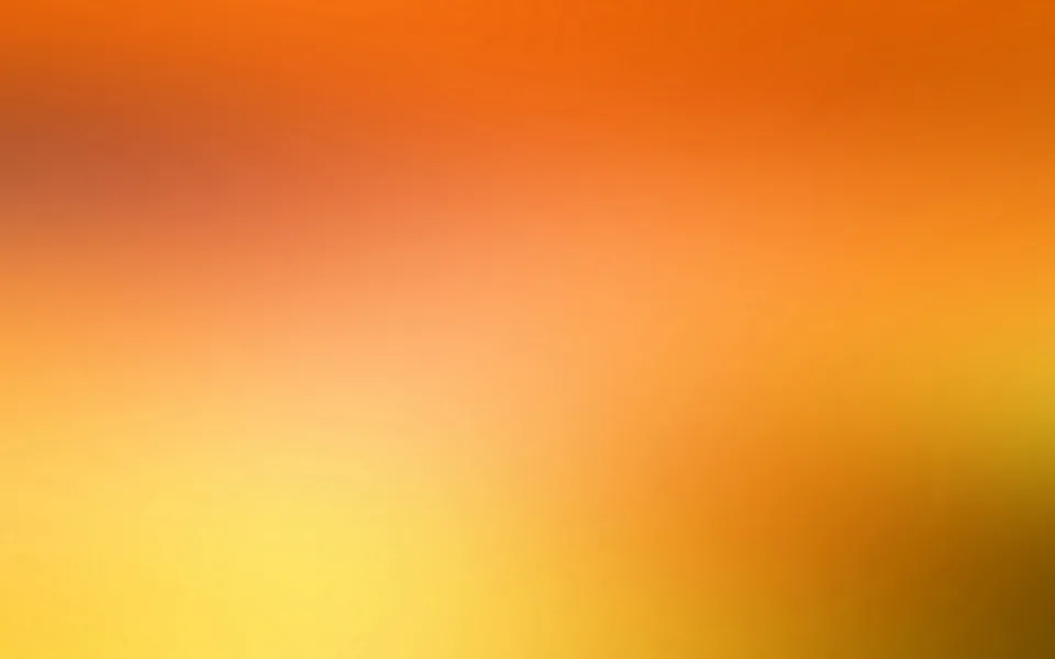 Weich verlaufender Farbverlauf von dunklem Orange oben über helles Gelb unten, rechts mit einem bräunlichen Schatten.