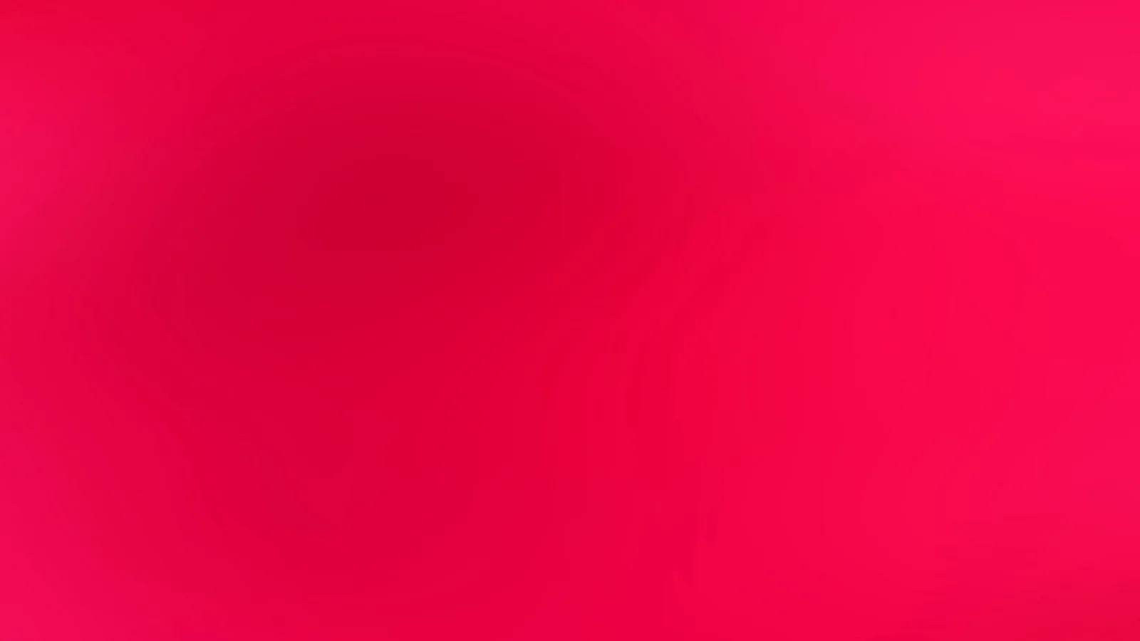 Weich verwischter Farbverlauf in Pink und Rot, dunklerer Bereich links der Mitte, heller zum rechten Rand.