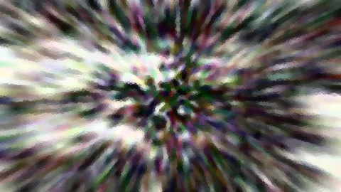 Abstrakte, radial verwischte Farbstreifen in Grün, Violett und Weiß, die von der Bildmitte nach außen laufen.