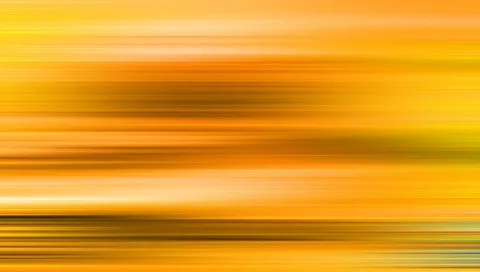 Horizontal verwischte Streifen in Orange, Gelb und Braun, die von oben nach unten ineinander übergehen.