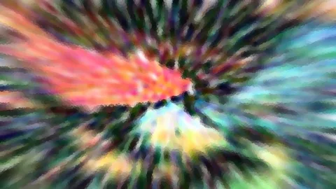 Abstrakte Komposition aus radial verwischten Farbstreifen in Rot, Orange, Grün und Blau, die von einem hellen Zentrum ausstrahlen.