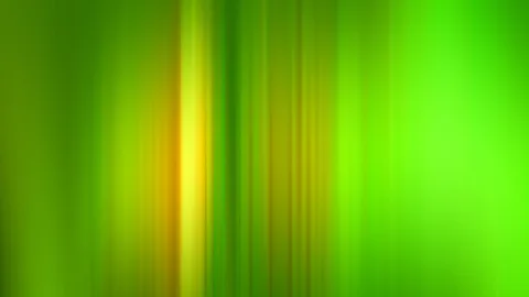 Vertikale, verschwommene Streifen in Grün und Gelb, in der Mitte ein heller gelber Lichtstreifen.