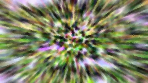 Abstraktes Bild mit radialen Streifen in Grün, Lila und Gelb, die von einem unscharfen Zentrum nach außen strahlen. Die Kanten wirken pixelig und mosaikartig.