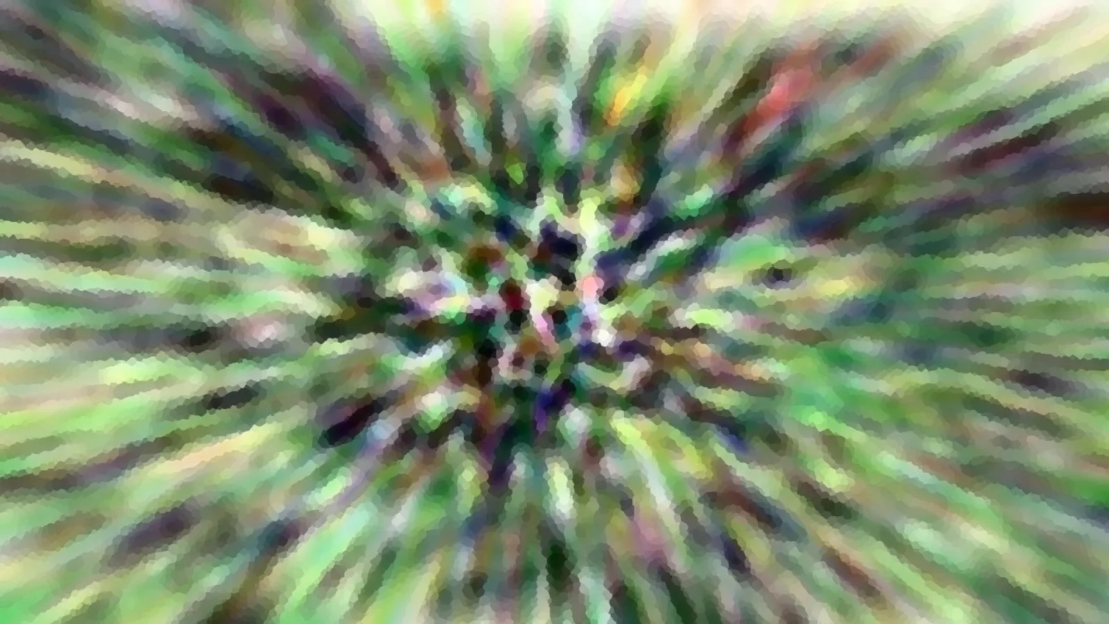 Radial verwischte Farbstreifen in Grün, Violett und Weiß, die von einem hellen Zentrum nach außen laufen.